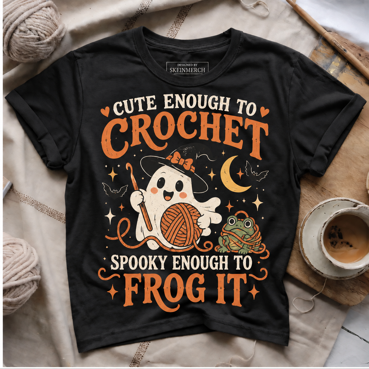 Cute Enough To Crochet Spooky Enough To Frog It Black flat lay T-Shirt mockup