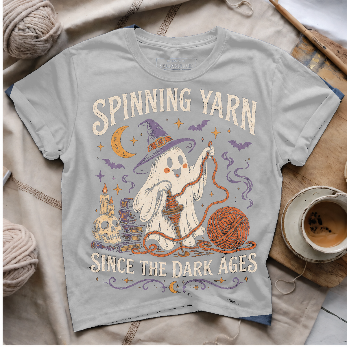 Spinning Yarn Since The Dark Ages Silver flat lay T-Shirt mockup